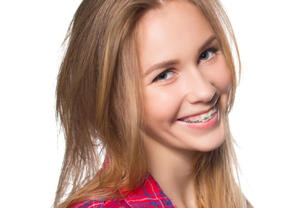 Girl with braces after receiving orthodontic treatment in Geelong.